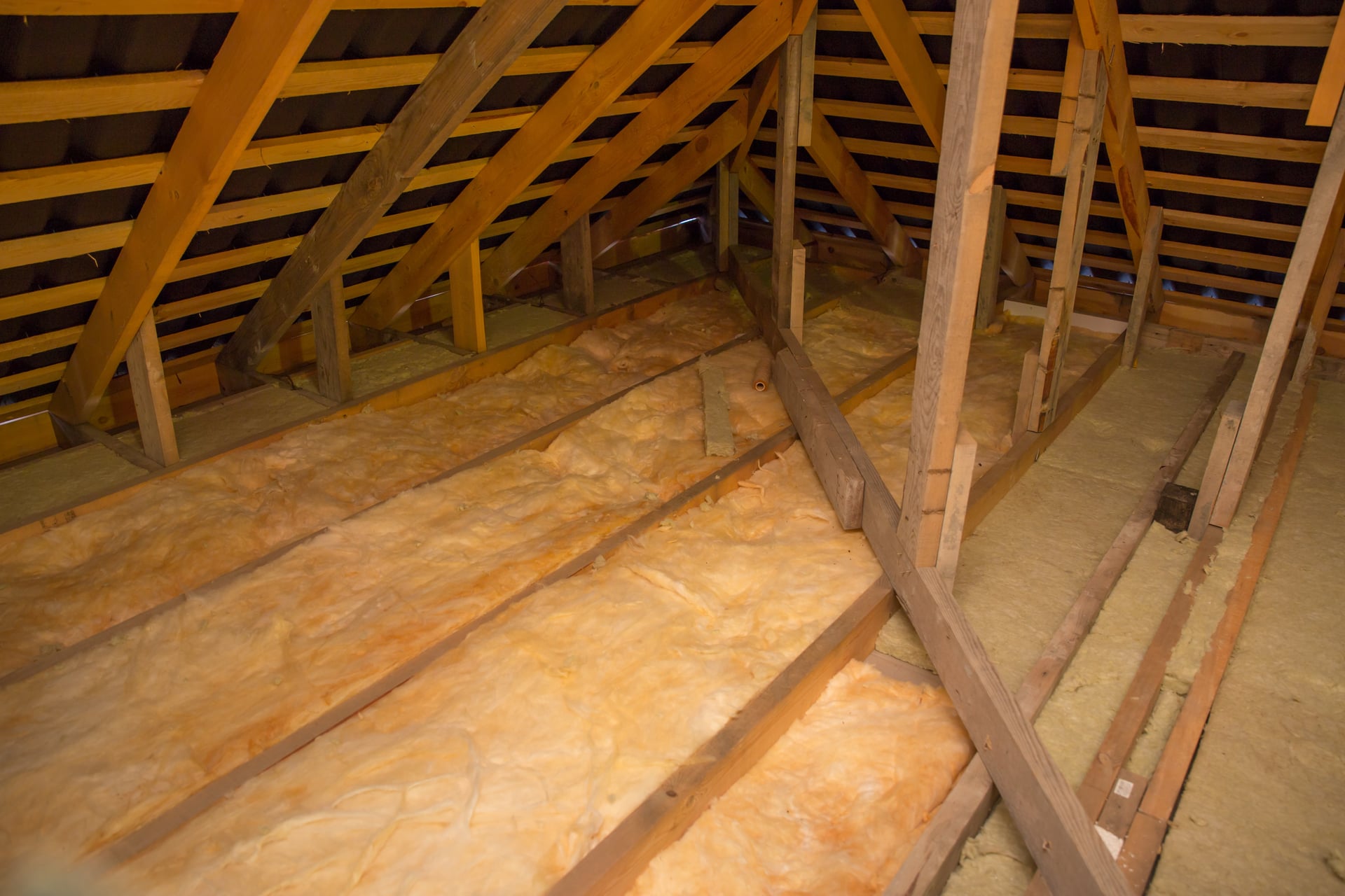Fiberglass insulation between joists