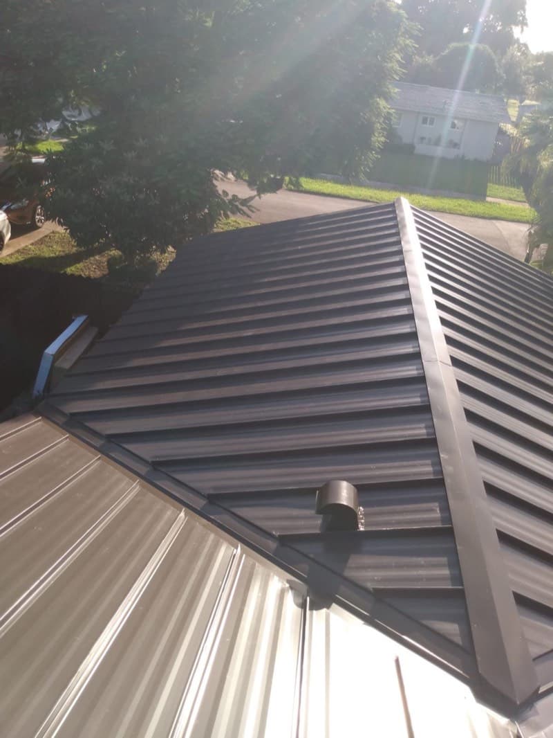 Dark metal roof with clean seams