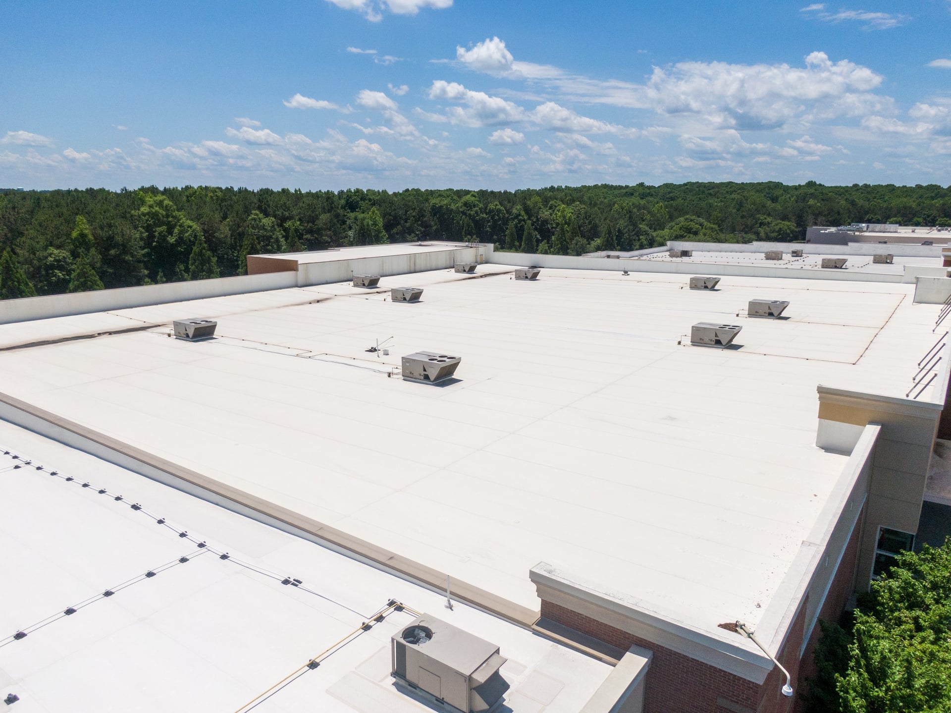 Commercial TPO flat roof with HVAC units