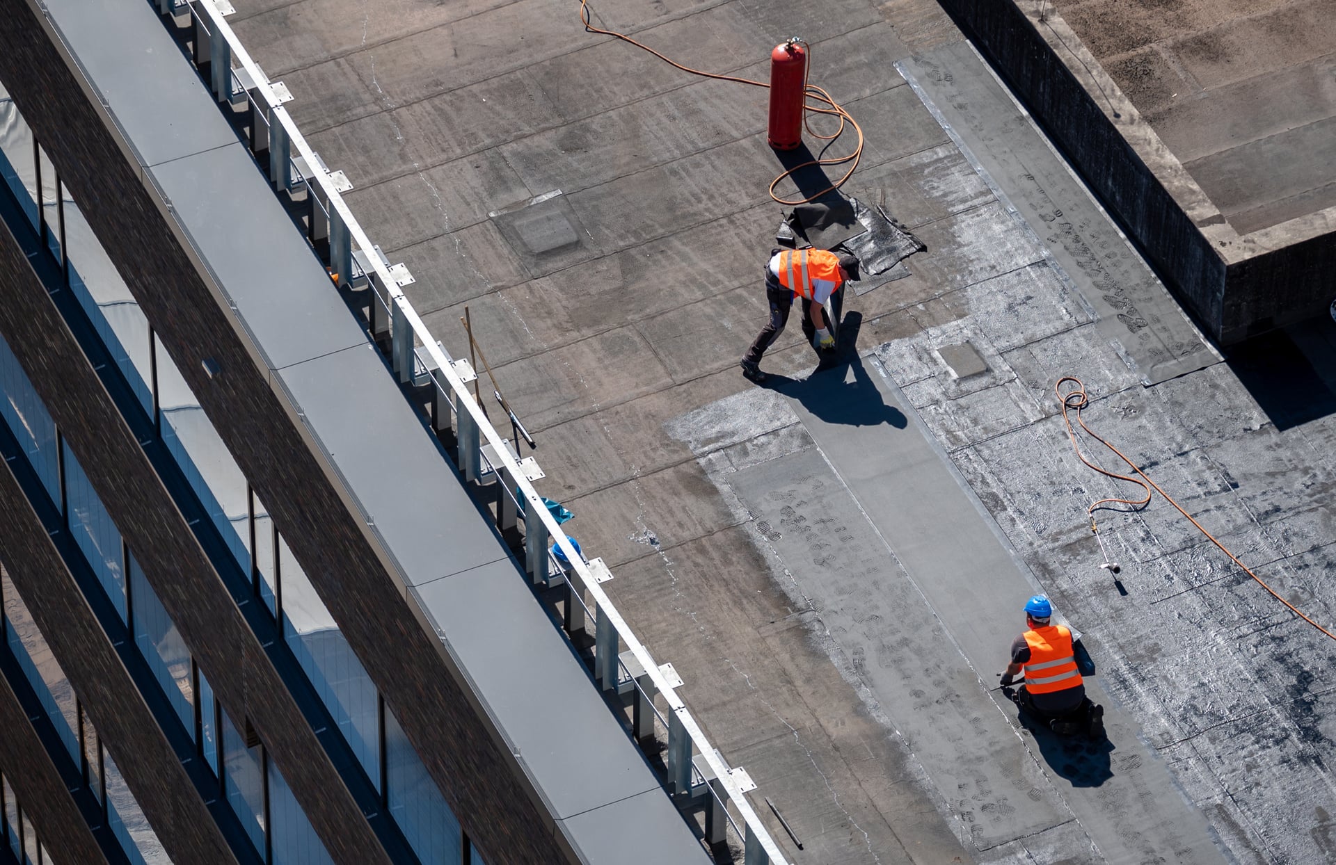 Crew working on commercial flat roof