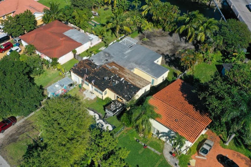 Drone view of roof restoration in progress