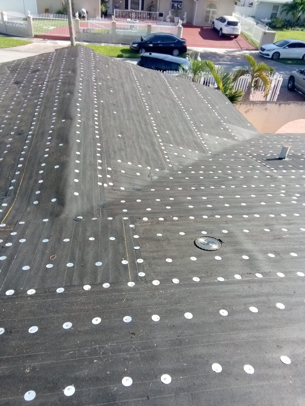 Gray shingle roof completed