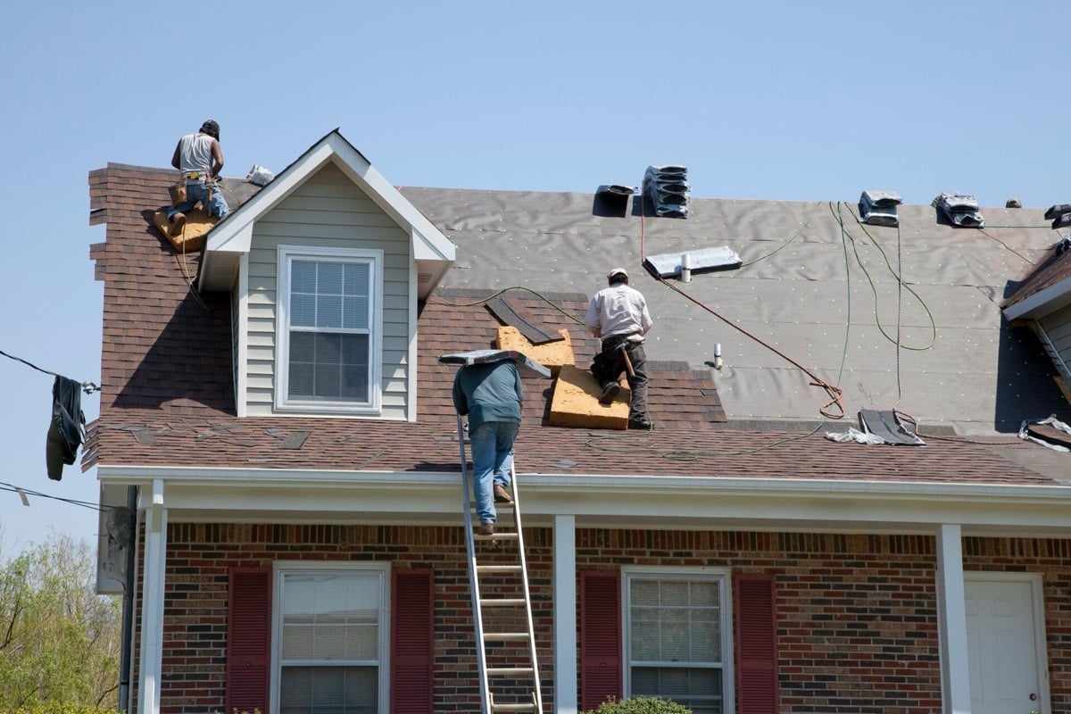 Repair crew at work on roof